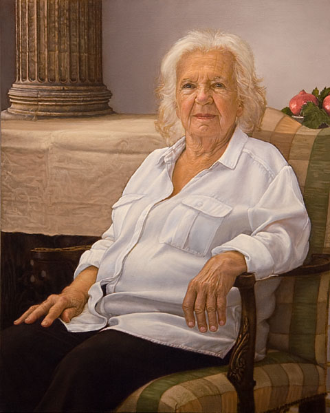 Portrait of the artist's mother in a chair. In the background is a piece of furniture with is a dish of pomegranates on it. Further back is a column.