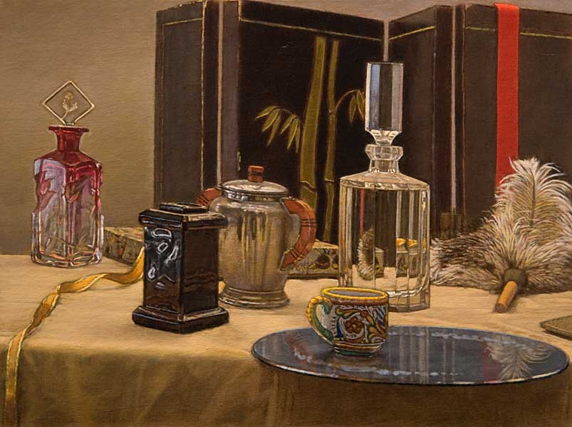Still life with glass bottles, a feather duster, red and gold ribbon, and a circular blue mirror lying flat on a table, with a folding Asian screen in the background.